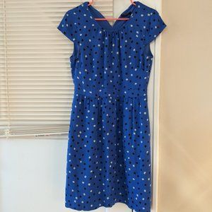 Blue dress with white and black spots